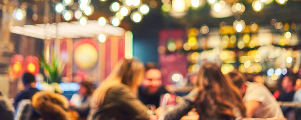 restaurant with people out of focus in the background